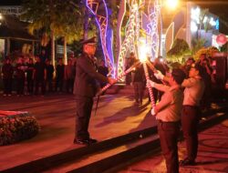 Pemkab Kotabaru Gelar Apel dan Pawai Taptu, Peserta Bawa Obor Keliling Kota