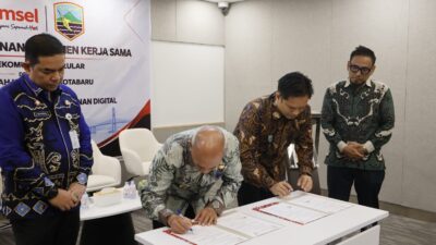 Transformasi Digital ASN Kotabaru, Bupati H. Muhammad Rusli Teken Kerja Sama Strategis dengan Telkomsel